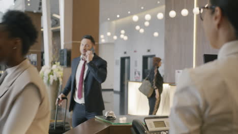 hotel reception with guests