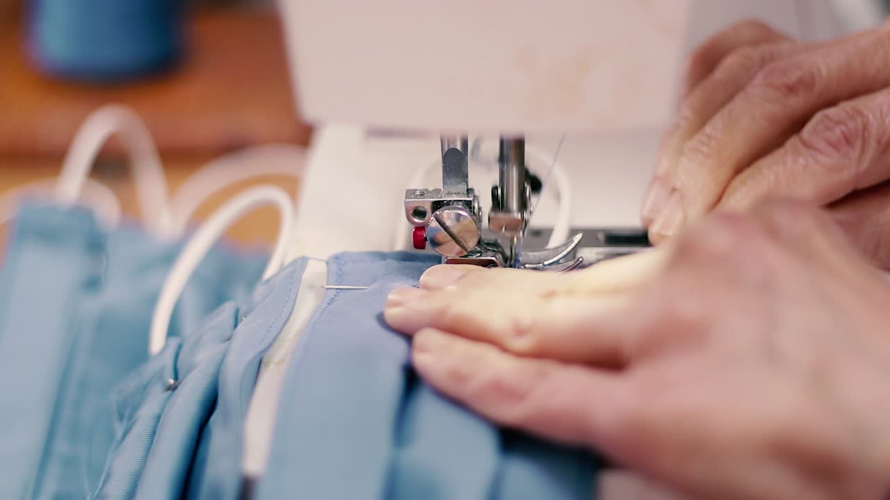 Manual work for creation and production of necessary covid-19 mask, Close up