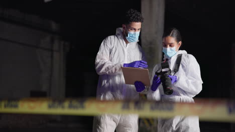 crime scene investigation with forensic scientists