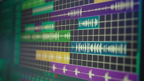 empty desk equipped with mixing console and music recording tools in home studio