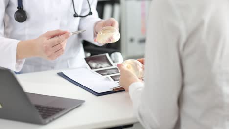 Doctor and patient discussing breast implants