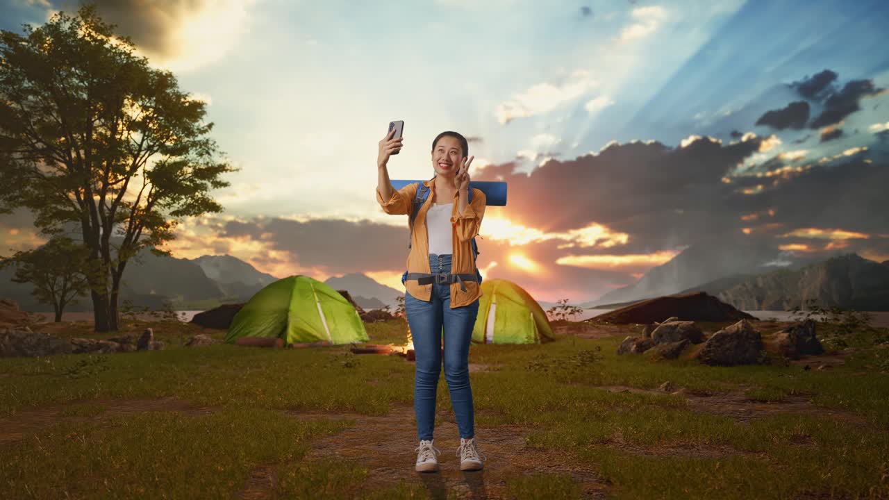 Happy Woman Taking Selfie at Campsite