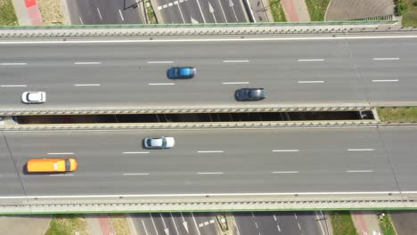 summer aerial footage of transport junction, traffic cross road junction day view from above with highway road