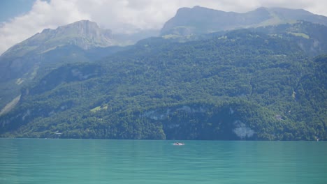 interlaken, switzerland, man ,surf board, lake, mountains, hillside, heavenly, picturesque, clouds, wide pan view