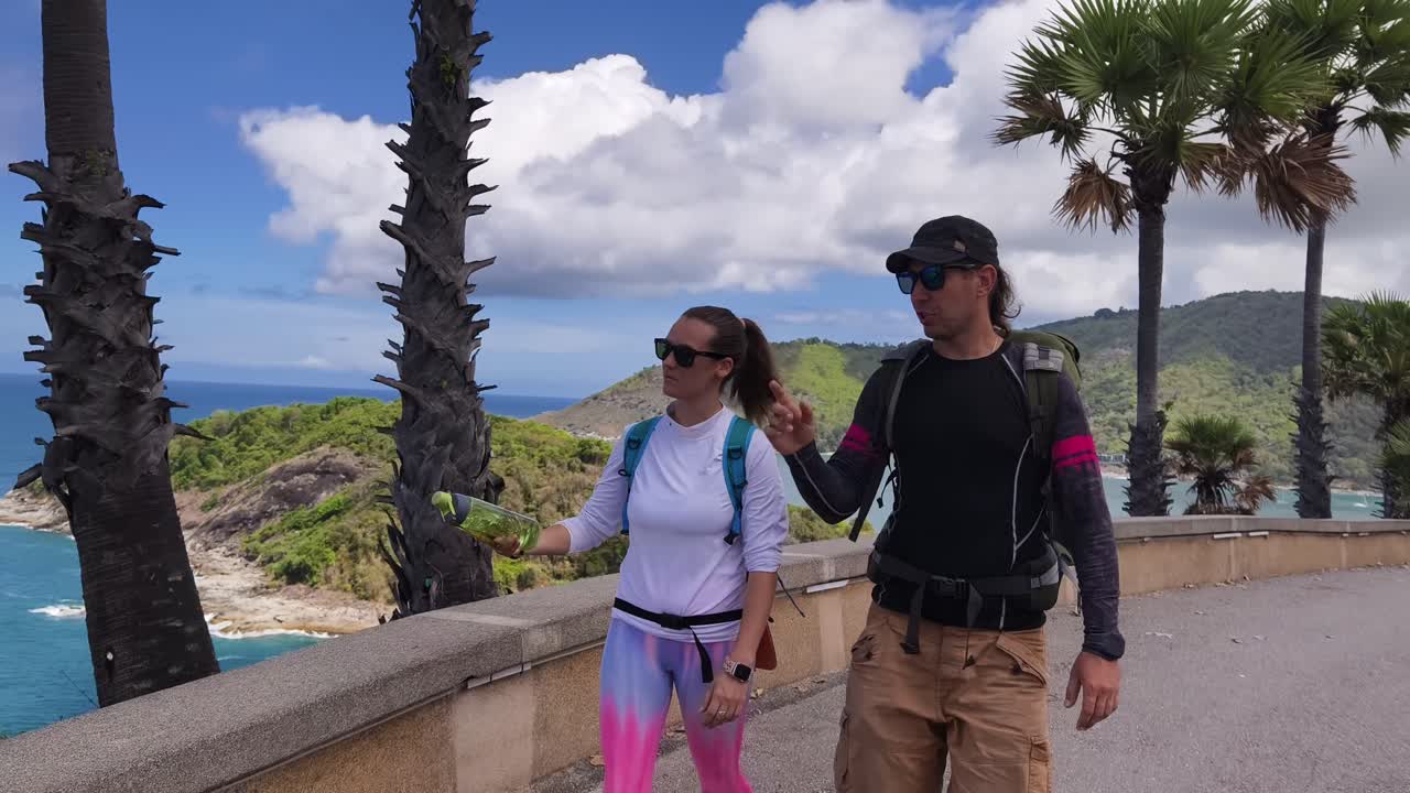 Couple Hiking at a Scenic Viewpoint in Thailand
