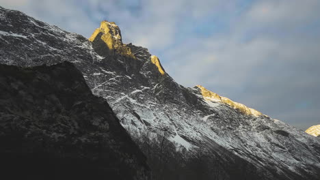 sunbeam at the trollryggen peak of the alpine mountain in the town of andalsnes, norway