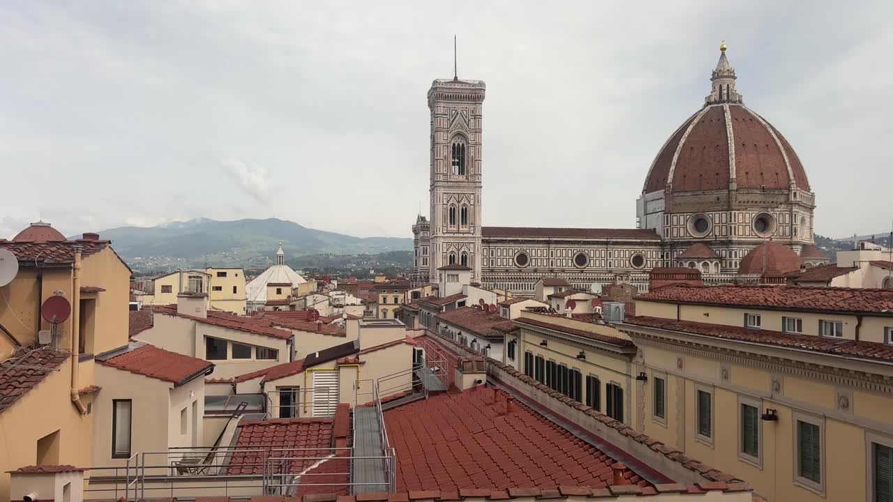 Medieval cathedral of Florence seeing from a roof terrace. Panning