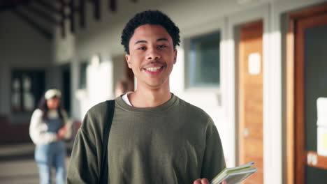 young smiling student on campus