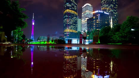 night illuminated guangzhou city canton tower water reflection panorama 4k time lapse china