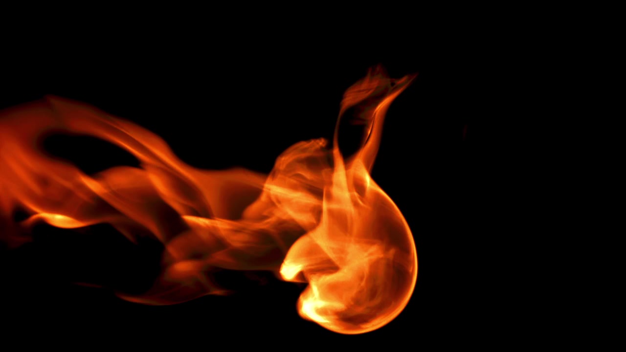 Abstract Fire and Smoke Flowing on Black Background