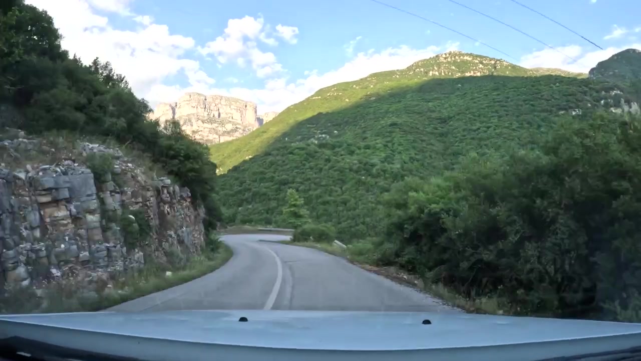 Driving in Serpentine Road in Zagori Greece, Inside Vehicle Point of View, Timelapse Shot, Fast Motion Drive in Hairpin Turns of Papigo