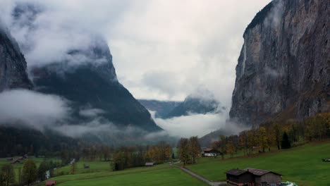 amazing aerial footage during autumn in switzerland from lauterbrunnen village located in the swiss mountains