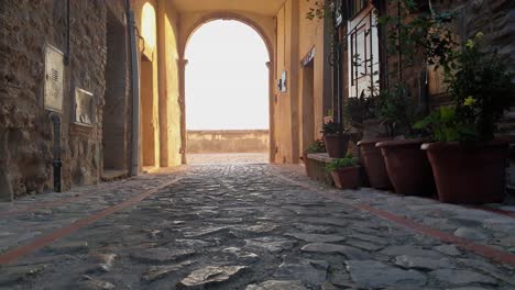 low angle first-person in penna in teverina historic center and porta novella