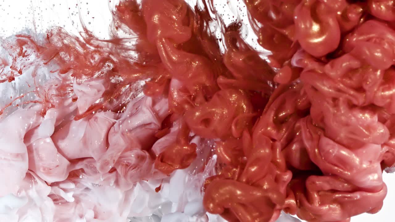 White and Red Gold Ink in Water