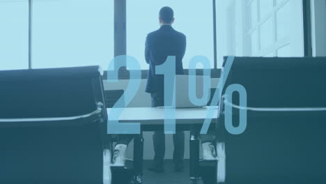 animation of increasing percentage against rear view of businessman looking out of window at office