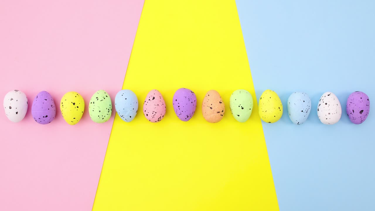 Eggs for Easter move up and down on colorful theme. Stop motion