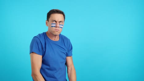 man cheering for el salvador, angry with the decision of referee