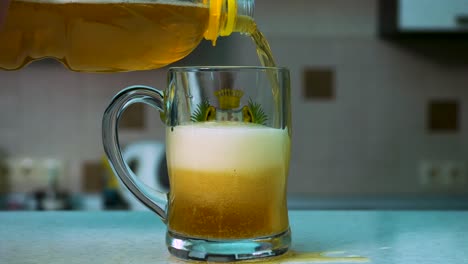 pouring soda/beer into a glass