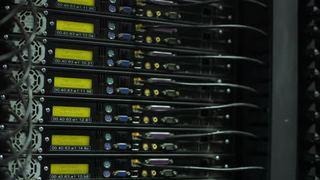 server rack with cables attached to panel switch ports, wayback machine internet archive library, panning shot