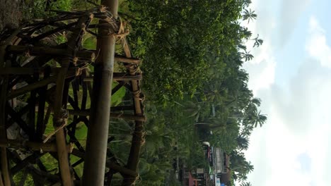 Slow-motion-dolly-shot-of-rice-baskets-or-grass-baskets-attached-to-bamboo-for-the-farmers-of-tegallalang-rice-lawns-on-bali-in-indonesia