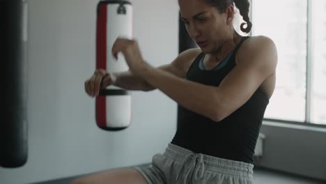 female boxer training in a gym