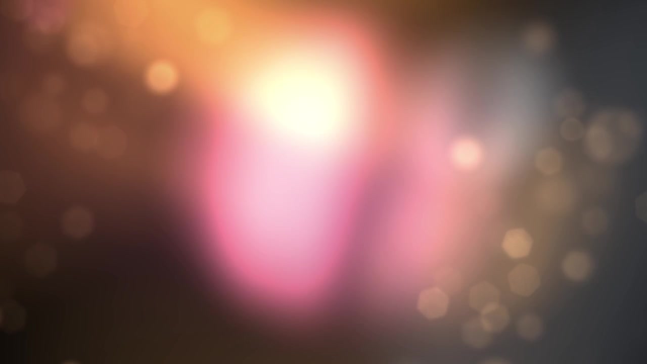 Colorful Bokeh Lights and Lens Flares Shifting on Dark Abstract Background