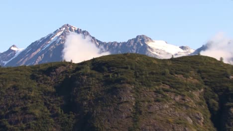 the beautiful mountains of alaska in the summer