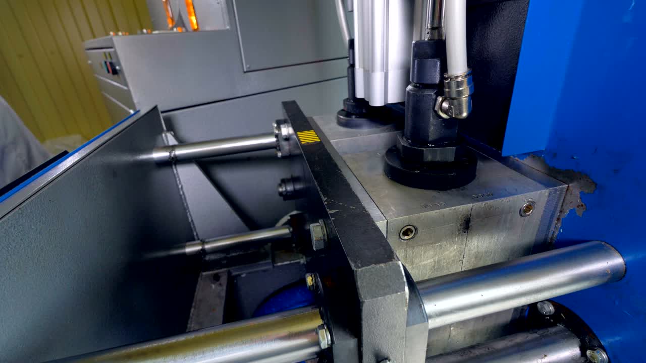 Preforms shaped into bottles in detailed view.