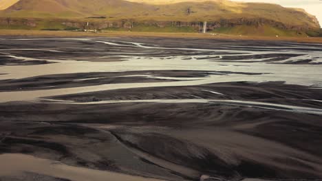 various shots by drone of an icelandic glacial river in beautiful sunset light