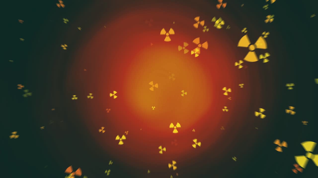 Radioactive symbols glowing intensely in swirling motion, with red, orange, and yellow particles creating a dramatic, hazardous energy effect