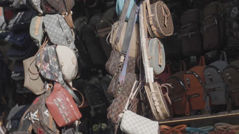 luxury handbags display at market