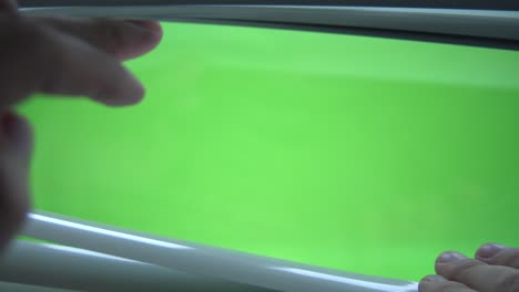 4k . hand open the jalousie. green screen