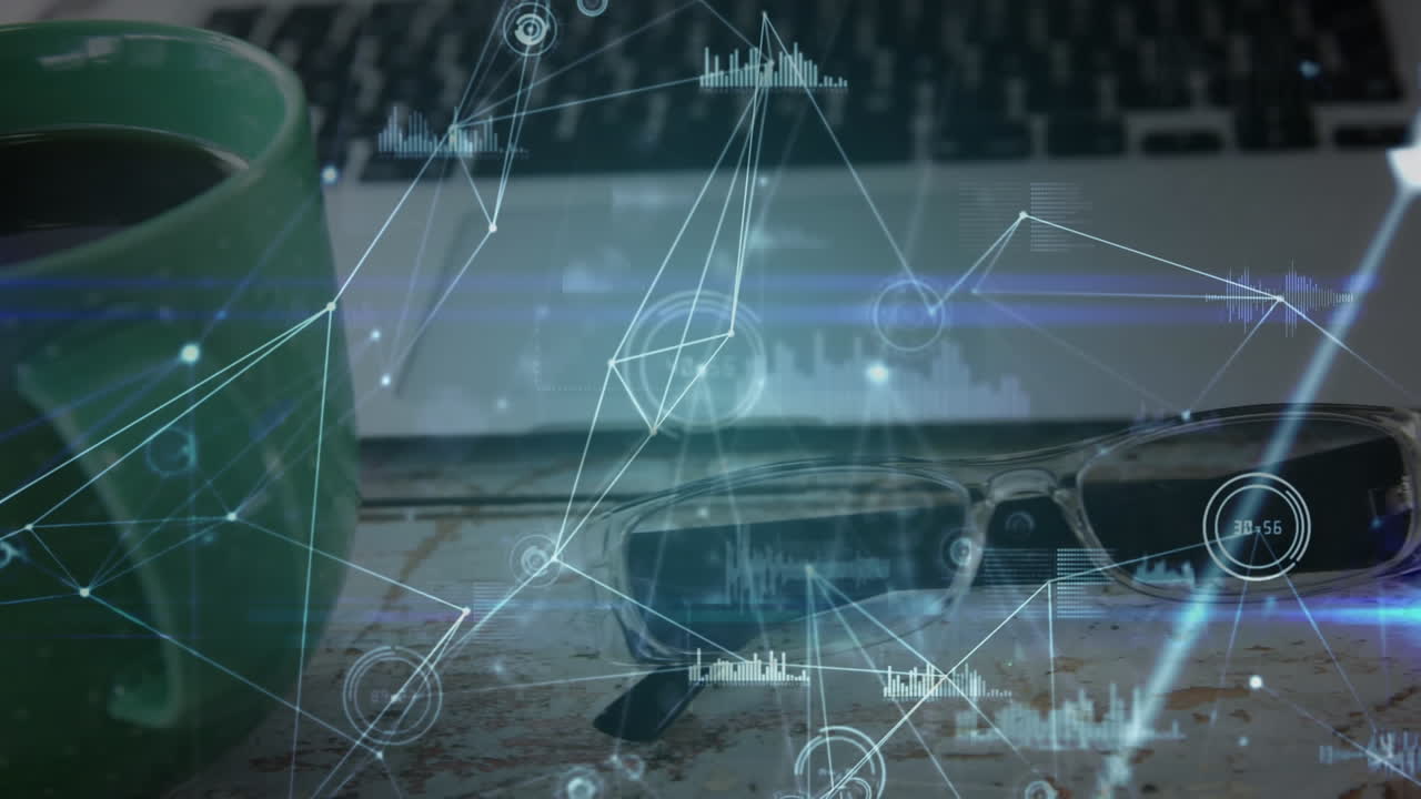 Animation of network of connections and data processing over laptop and glasses on desk