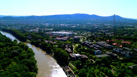 aerial view of tranquil river in obuda island, budapest, hungary - drone shot