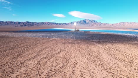 Solar-farm-in-the-Mojave-Desert-looks-like-a-mirage---blue-solar-panel-field-aerial