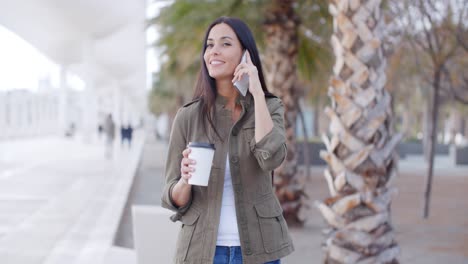 Smiling-trendy-young-woman-taking-a-call