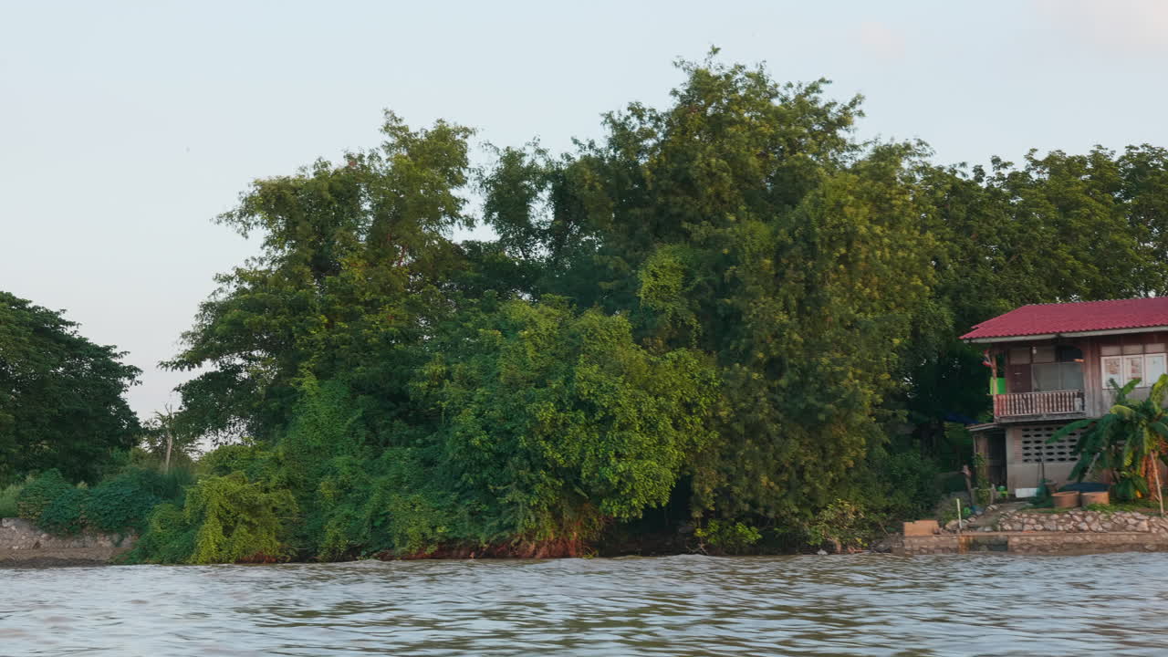 Small Wooden House by the River in Thailand