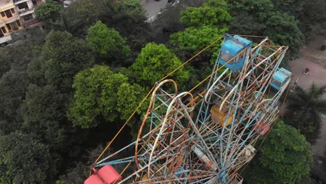 an overhead perspective of hanoi's abandoned ferris wheel, aerial