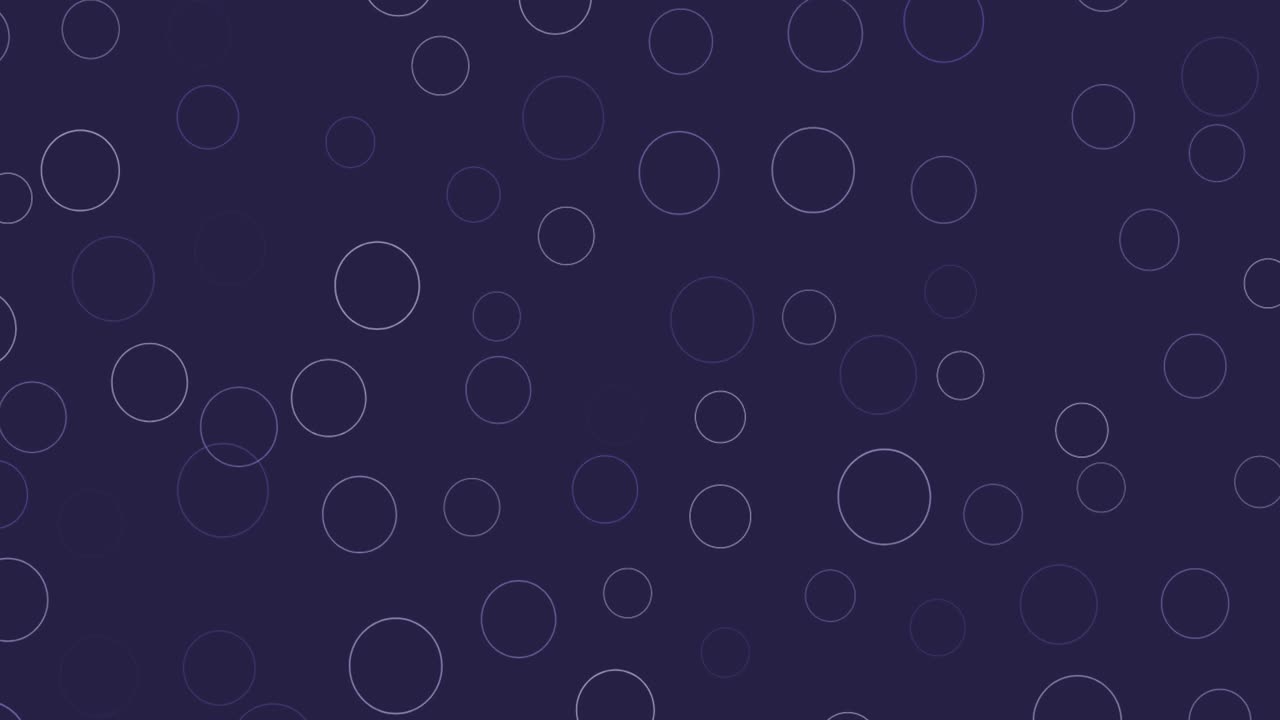 Digital animation of multiple grey circular shapes against purple background