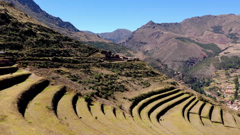 the remarkable agricultural terraces of the pisac archaeological park in peru. the footage showcases the curved, layered terraces and the stunning natural beauty of the sacred valley