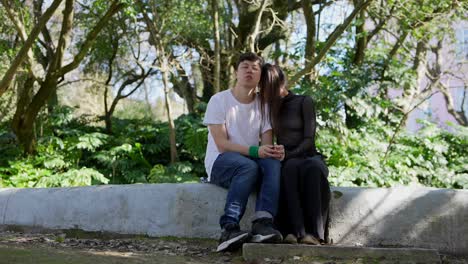 couple sitting in a park
