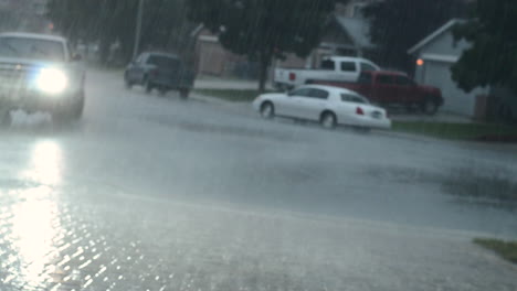 truck drives through heavy rain