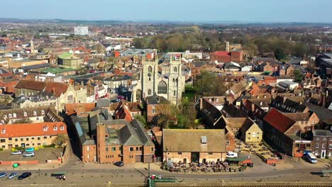 Close-up-aerial-view-of-Kings-Lynn-Minster,-River-Great-Ouse,-Kings-Lynn,-Norfolk,-UK