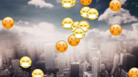 Animation-of-emojis-falling-over-a-cityscape-in-the-background.-