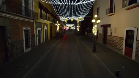 drone video of the christmas light decorations in the colonial architecture streets