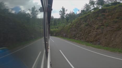 cinematic point of view shot out bus window in sri lanka