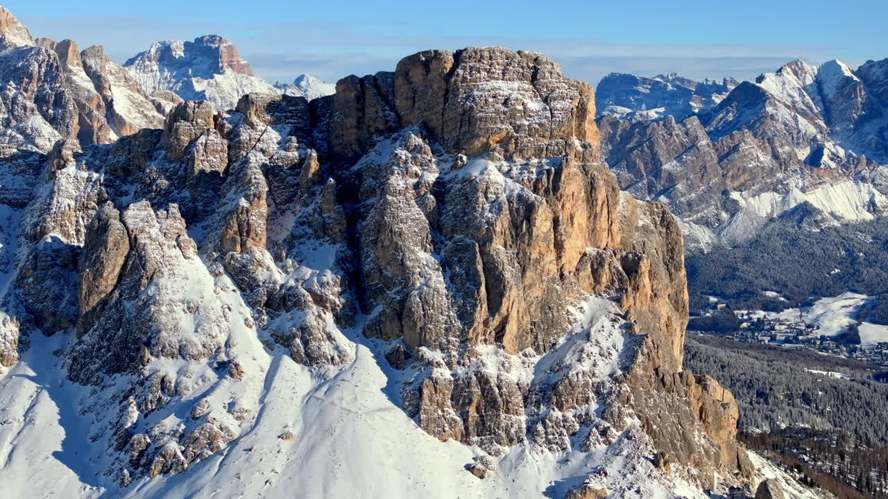 Aerial drone view of snow on the mountains in the Dolomites, Italy