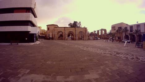 antique and modern buildings on the square in front of lala mustafa pasha mosque st nicholas cathedral