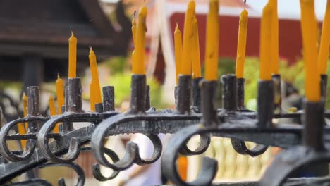 yellow candles in a temple