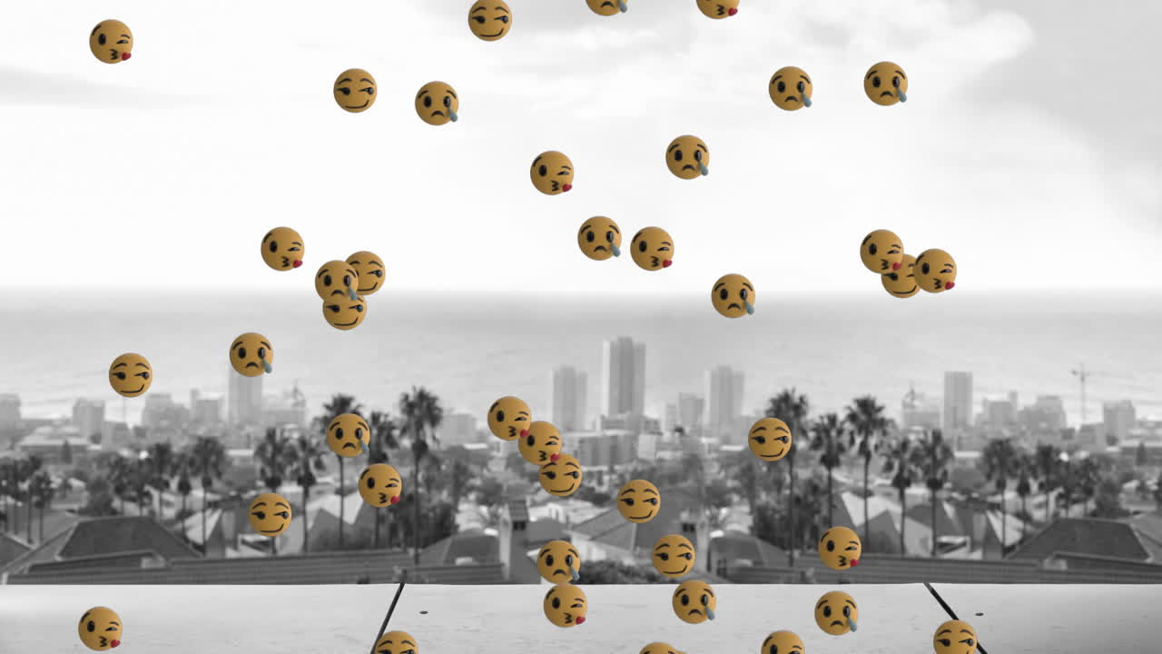 Animation of emoji icons over cityscape